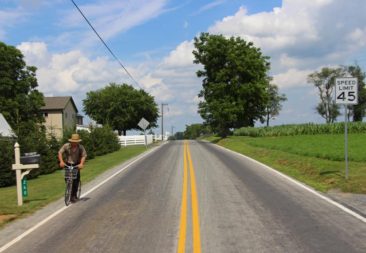 An Amish man on a bicycle