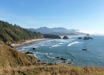 The view from Ecola State Park with Haystack Rock and Cannon Beach in the distance